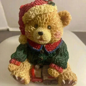 Teddy bear with train holiday resin figurine
